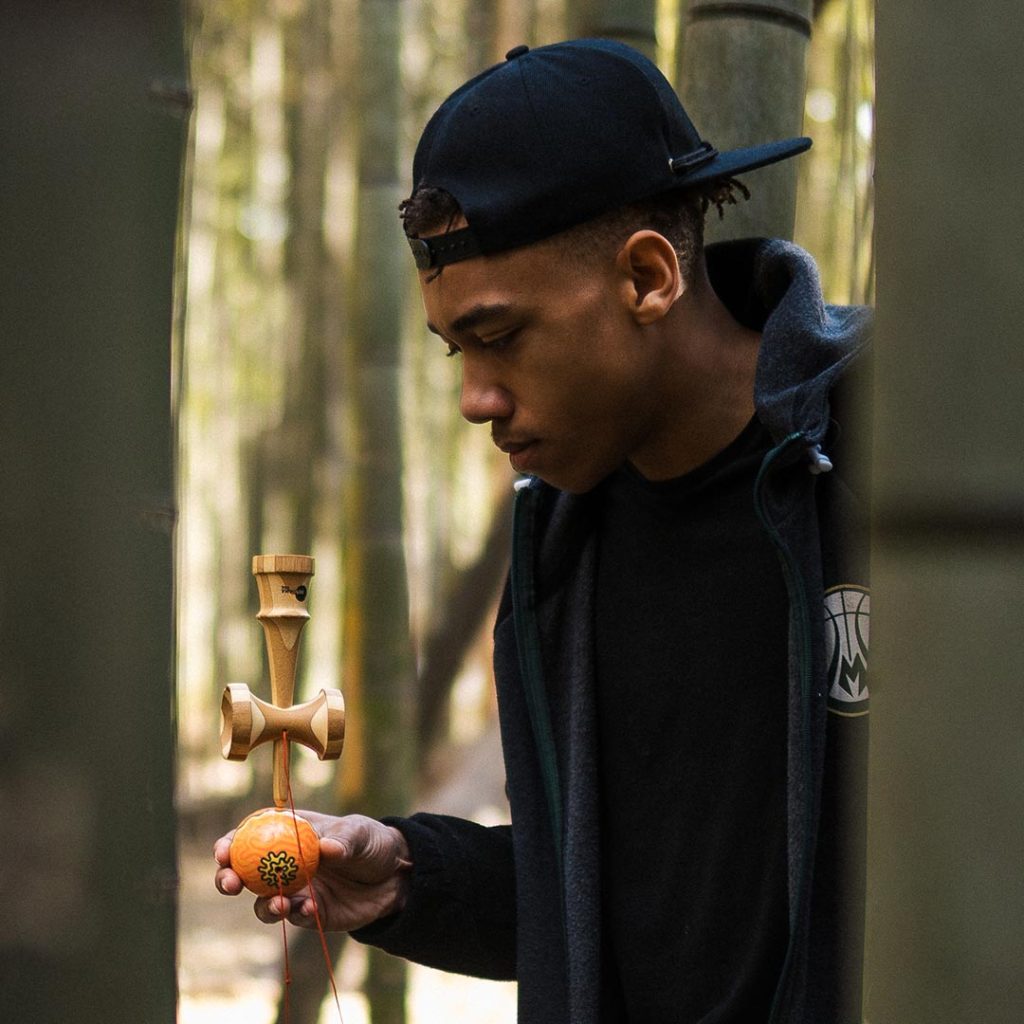 Jay Lawrence Performing Border Balance Kendama Trick